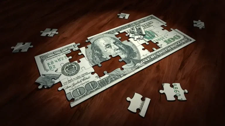 Nota de dólar em quebra cabeça. Foto: Pixabay